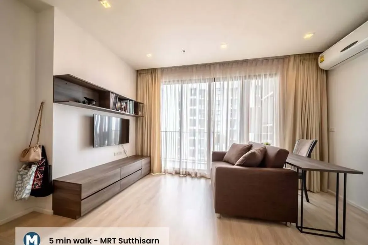 Elevated Urban Living at Quinn Ratchada • 21st Floor Pool View